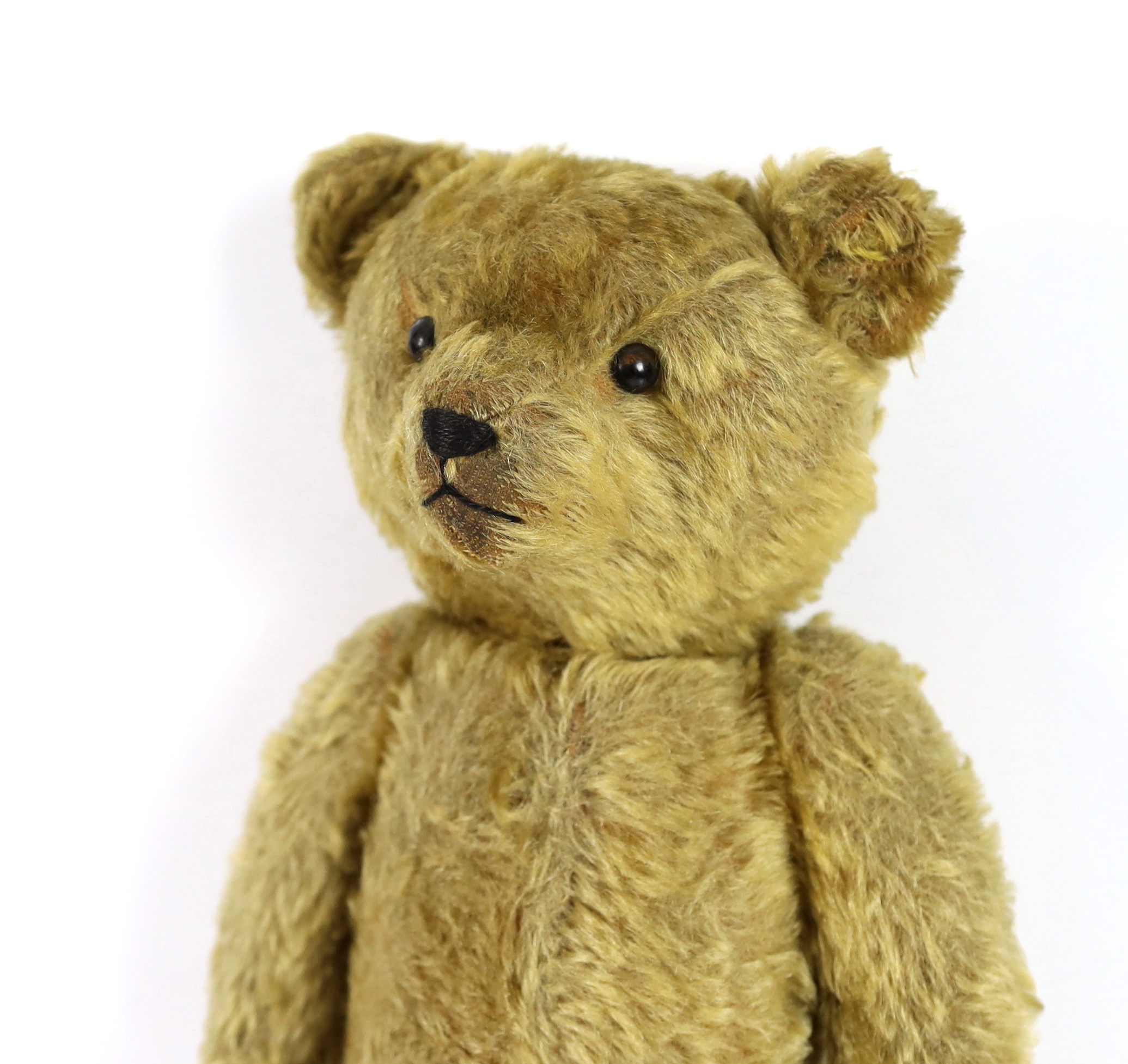 An early German bear, c.1912, black button eyes, 45cm, old repair to paws, good mohair